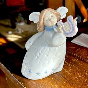 Lladro angel playing harp